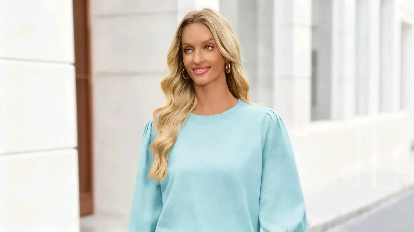 The woman went out for a stroll wearing a cicybell blue sweater.