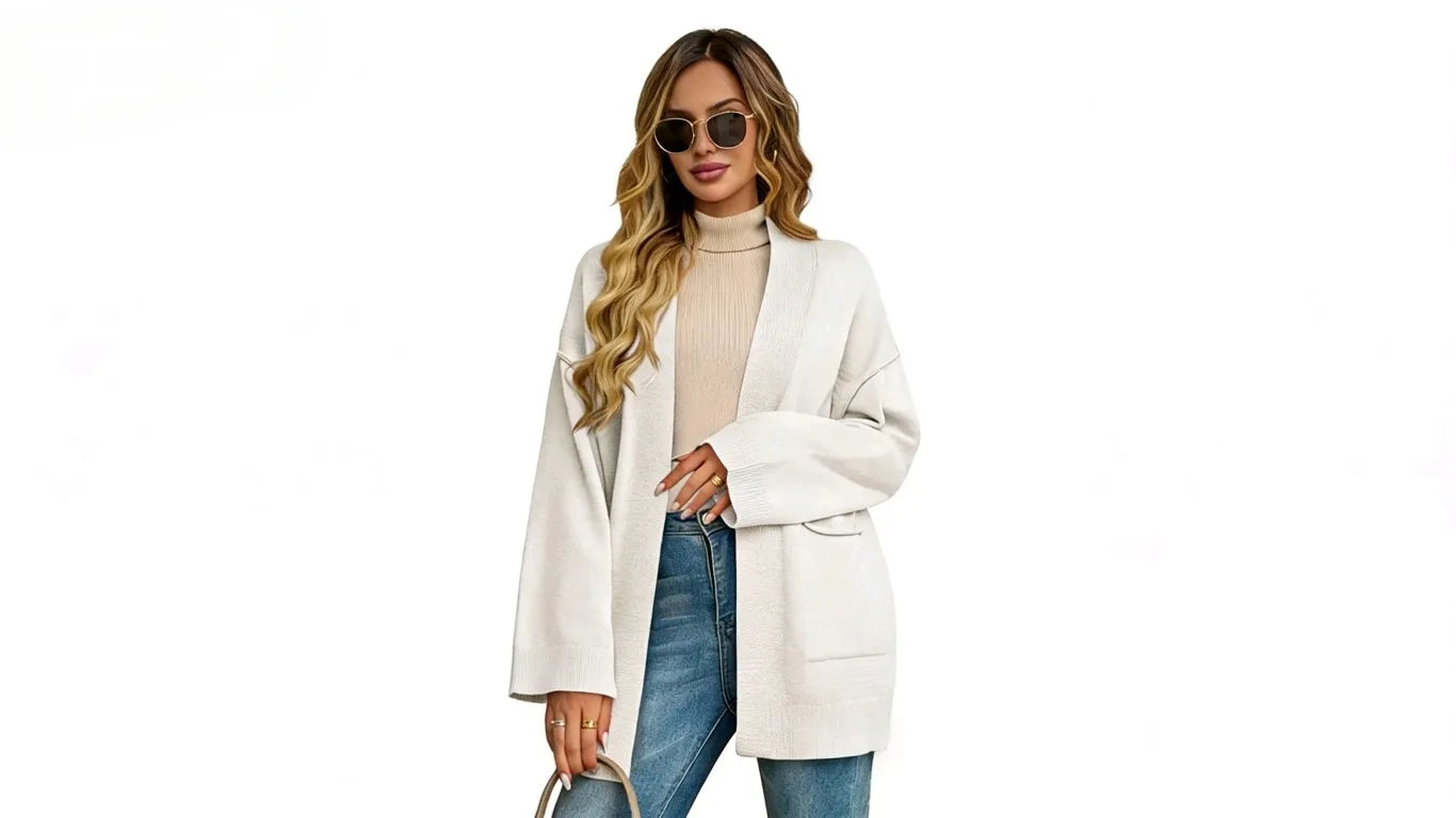 The woman was wearing Cicybell Women's White Oversized Cardigans