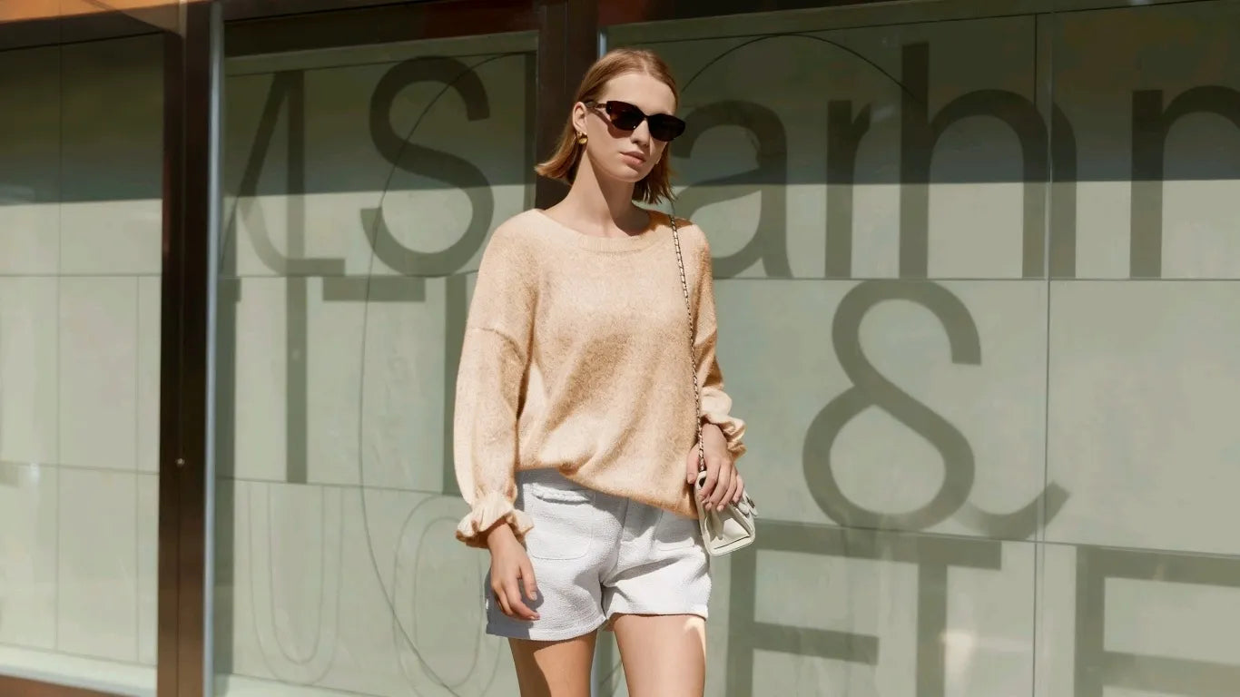 A woman went out wearing Cicy Bell Women's Apricot Ruffle Sweaters