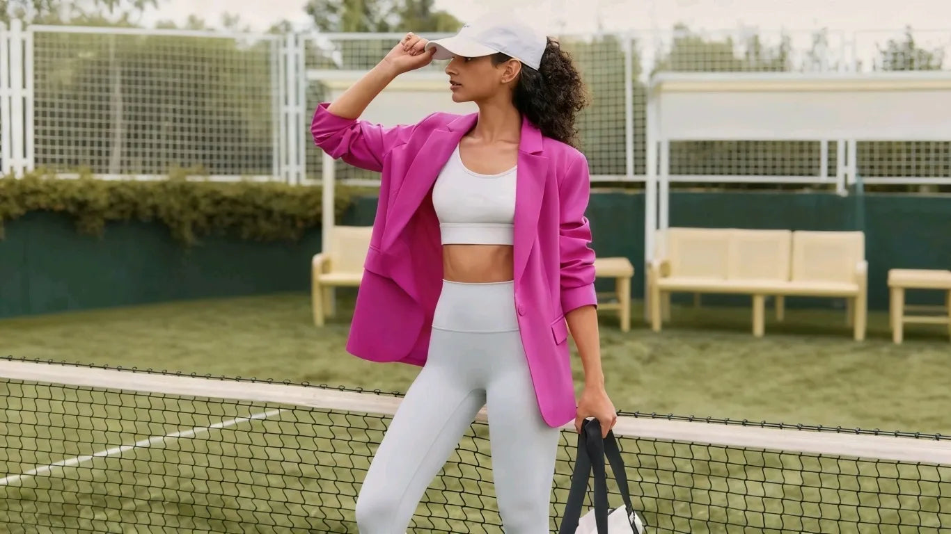 Woman wearing cicybell blazer as sport coat on tennis court