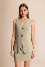 Professional woman wearing a smart casual olive green waistcoat and mini skirt 2-piece set