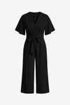 CicyBell Women's Black Wide-Leg Romper featuring an elegant tie-knot front and flowy flutter sleeves. This chiffon-feel one-piece outfit offers a flattering V-neckline and elastic waist, perfect for beach weddings or office wear.
