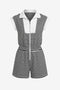 CicyBell Women's Striped Romper featuring a functional zip-up lapel and a flattering elastic waist. This sporty-chic one-piece summer outfit includes cap sleeves and deep side pockets, perfect for a tennis match or seaside brunch.