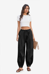 Cicy Bell Women's 100% Cotton Harem Pants featuring a trendy balloon silhouette and a flattering high-waisted fit. These breathable boho-chic trousers include an adjustable drawstring waist and tapered ankles for festivals or lounging.