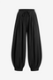 Cicy Bell Women's 100% Cotton Harem Pants featuring a trendy balloon silhouette and a flattering high-waisted fit. These breathable boho-chic trousers include an adjustable drawstring waist and tapered ankles for festivals or lounging.