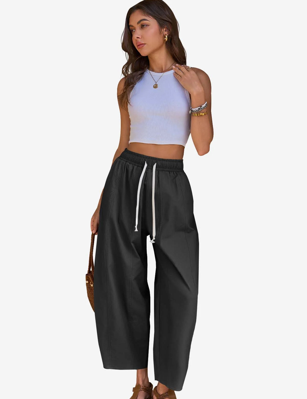 Cicy Bell Women's Barrel Pants featuring a trendy baggy fit and unique vertical seam details. These breathable cotton trousers include an adjustable drawstring waist and a relaxed "horseshoe" silhouette for an effortless street style look.