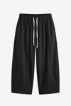 Cicy Bell Women's Barrel Pants featuring a trendy baggy fit and unique vertical seam details. These breathable cotton trousers include an adjustable drawstring waist and a relaxed "horseshoe" silhouette for an effortless street style look.