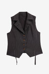 Cicy Bell Women's 2-Piece Pinstripe Vest Set featuring a tailored button-down vest with an adjustable back tie and high-waisted wide-leg pants. This sophisticated pinstripe power suit offers a flattering elongating silhouette for office meetings.