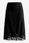 CicyBell Women's Black Satin Midi Skirt featuring a romantic lace hem and an elegant mermaid silhouette. This high-waisted A-line skirt offers a lustrous, high-end finish perfect for the office or a sophisticated date night.