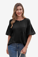 CicyBell Women's Black Puff Sleeve Blouse featuring chic lantern short sleeves and a classic crew neck with a functional chest pocket. This relaxed-fit summer top is a versatile staple for weekend brunch or seaside escapes.