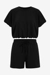 CicyBell Women's Black 2-Piece Set featuring a short puff sleeve top and matching drawstring shorts with pockets. A chic and cozy loungewear outfit perfect for summer coffee runs and casual daily wear.