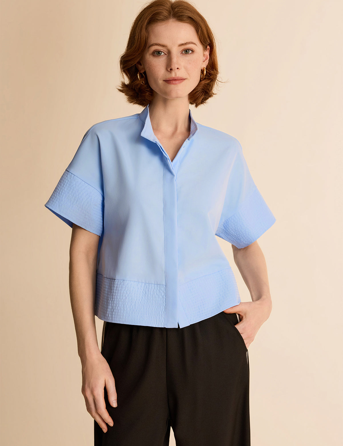 Cicy Bell Women's Cropped Blouse in a modern boxy silhouette featuring a sophisticated stand collar and oversized drop shoulders. This "Quiet Luxury" short shirt includes refined multi-row stitch detailing at the cuffs and hem for a structured look.