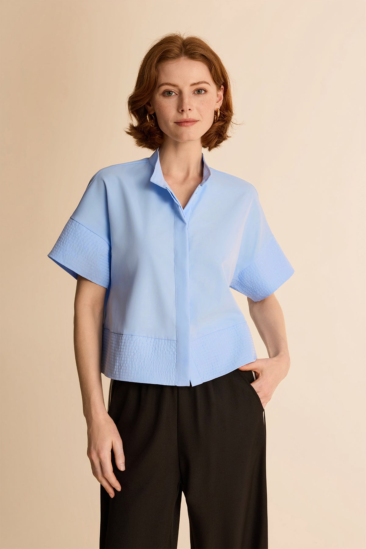 Cicy Bell Women's Cropped Blouse in a modern boxy silhouette featuring a sophisticated stand collar and oversized drop shoulders. This "Quiet Luxury" short shirt includes refined multi-row stitch detailing at the cuffs and hem for a structured look.