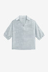 CicyBell Women's Metallic Top featuring a high-gloss finish and a chic lapel V-neckline. This shiny, loose-fit blouse with 3/4 elastic cuff sleeves is a statement piece for festival nights or club settings.