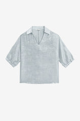CicyBell Women's Metallic Top featuring a high-gloss finish and a chic lapel V-neckline. This shiny, loose-fit blouse with 3/4 elastic cuff sleeves is a statement piece for festival nights or club settings.