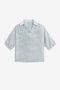 CicyBell Women's Metallic Top featuring a high-gloss finish and a chic lapel V-neckline. This shiny, loose-fit blouse with 3/4 elastic cuff sleeves is a statement piece for festival nights or club settings.