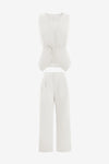 Cicy Bell Women's 2-Piece Vest Set featuring a tailored sleeveless blazer with an adjustable tie-waist and breezy wide-leg trousers. This modern power suit offers a flattering cinched silhouette and functional side pockets for a professional look.