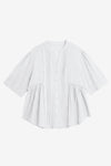 A textured CicyBell pleated peplum blouse for women. Highlights the unique layered aesthetic from the front and back pleating and functional button closure. Crafted from breathable, wrinkle-resistant cotton for an effortlessly put-together summer style.