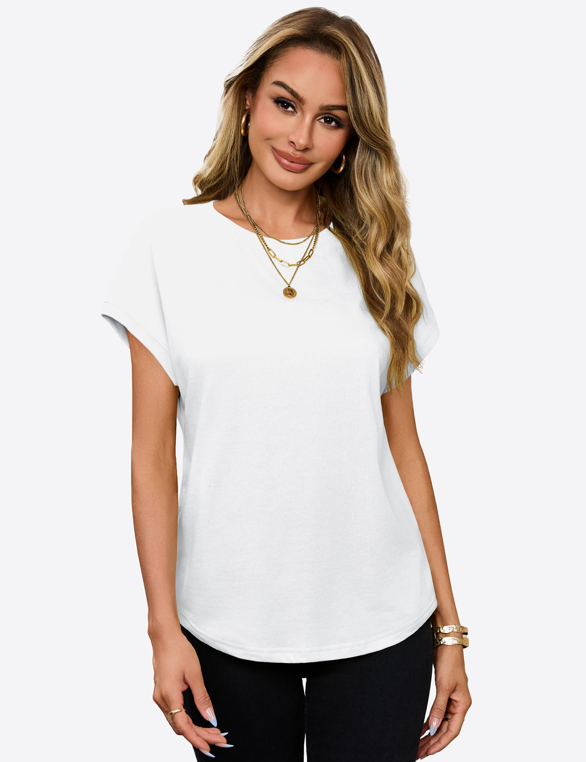 A trendy oversized Cicy Bell cap sleeve top in a breathable cotton-poly blend. Highlights the feminine cap sleeves and wide armholes for a breezy feel, ideal for running errands or lounging on vacation.