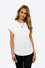 A trendy oversized Cicy Bell cap sleeve top in a breathable cotton-poly blend. Highlights the feminine cap sleeves and wide armholes for a breezy feel, ideal for running errands or lounging on vacation.